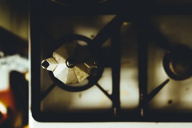 Close-up view of the cast-iron burner on a traditional range cooker